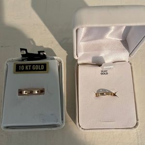 2 10kt gold baby rings.